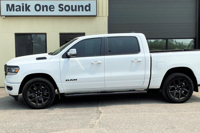2023 RAM 1500 with professional window tint in North Bay